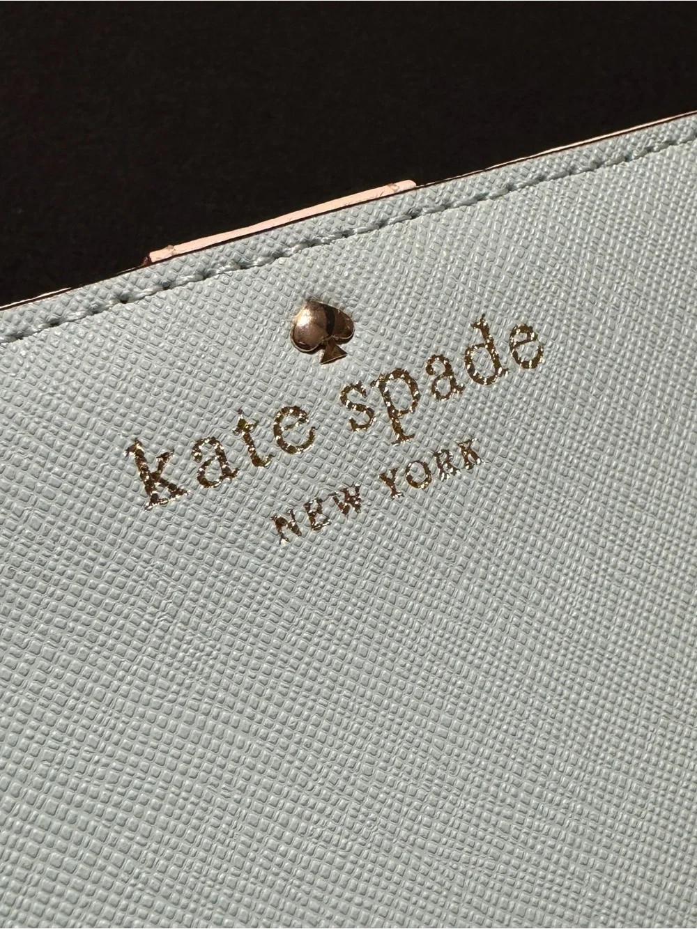 NWOT Kate Spade light blue wallet with gold logo
